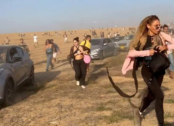 Participants at the Nova Festival flee for their lives